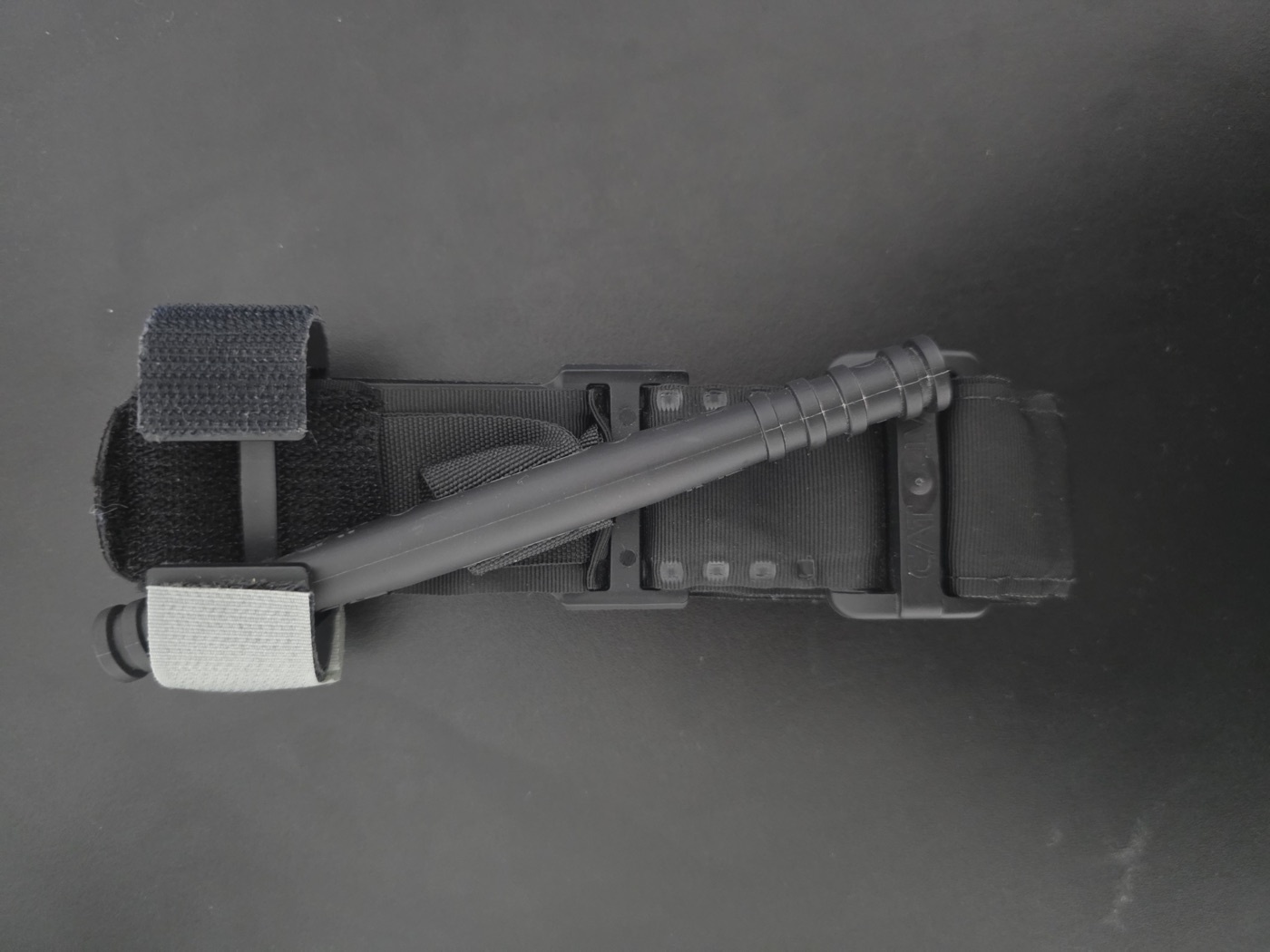 Figure 8. A windlass limb tourniquet (Combat Application Tourniquet) for controlling exsanguinating external limb haemorrhage. Source: Struppig taucher, via Wikimedia Commons, CC BY 4.0.